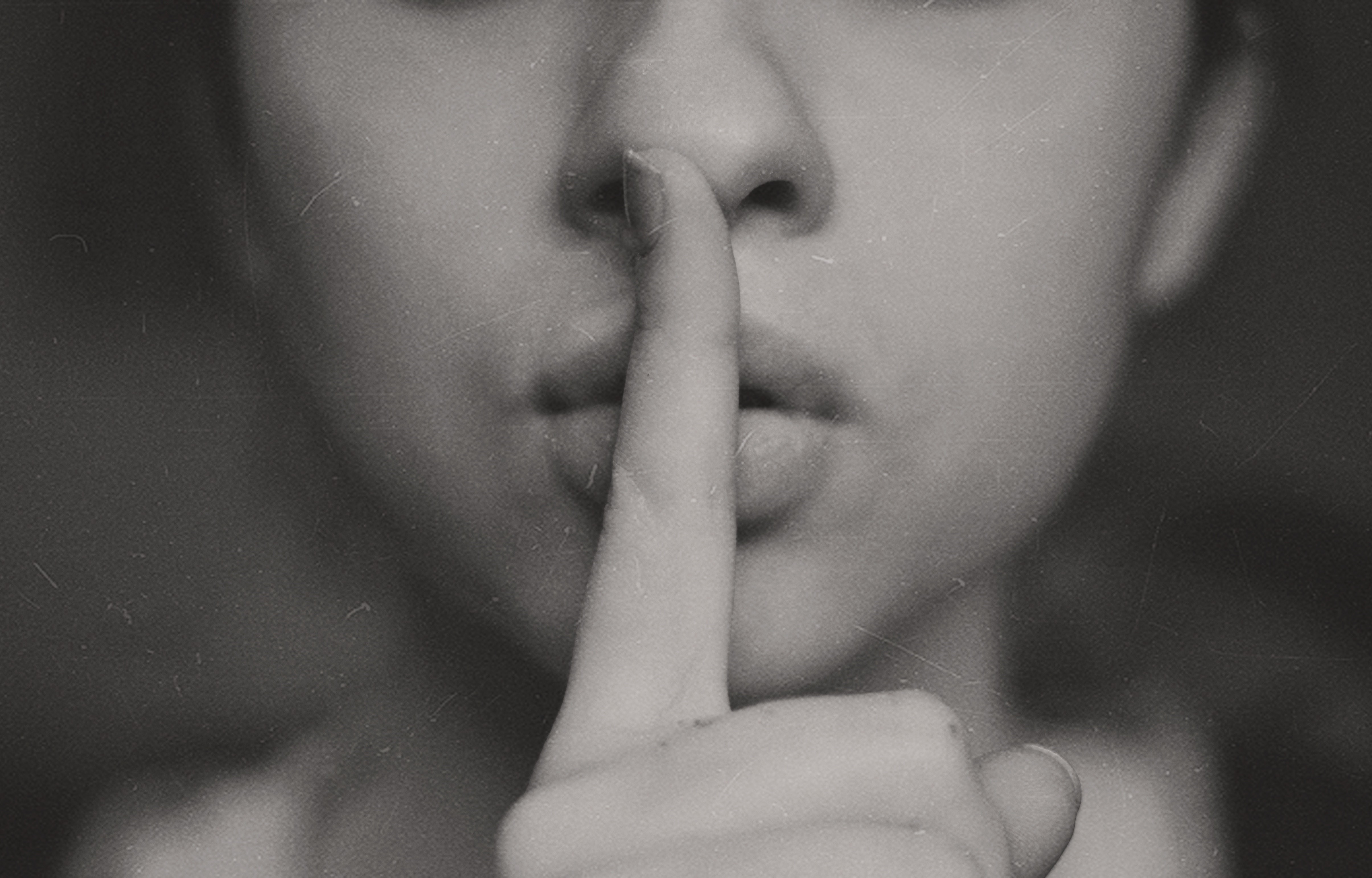 Shhh finger over lips